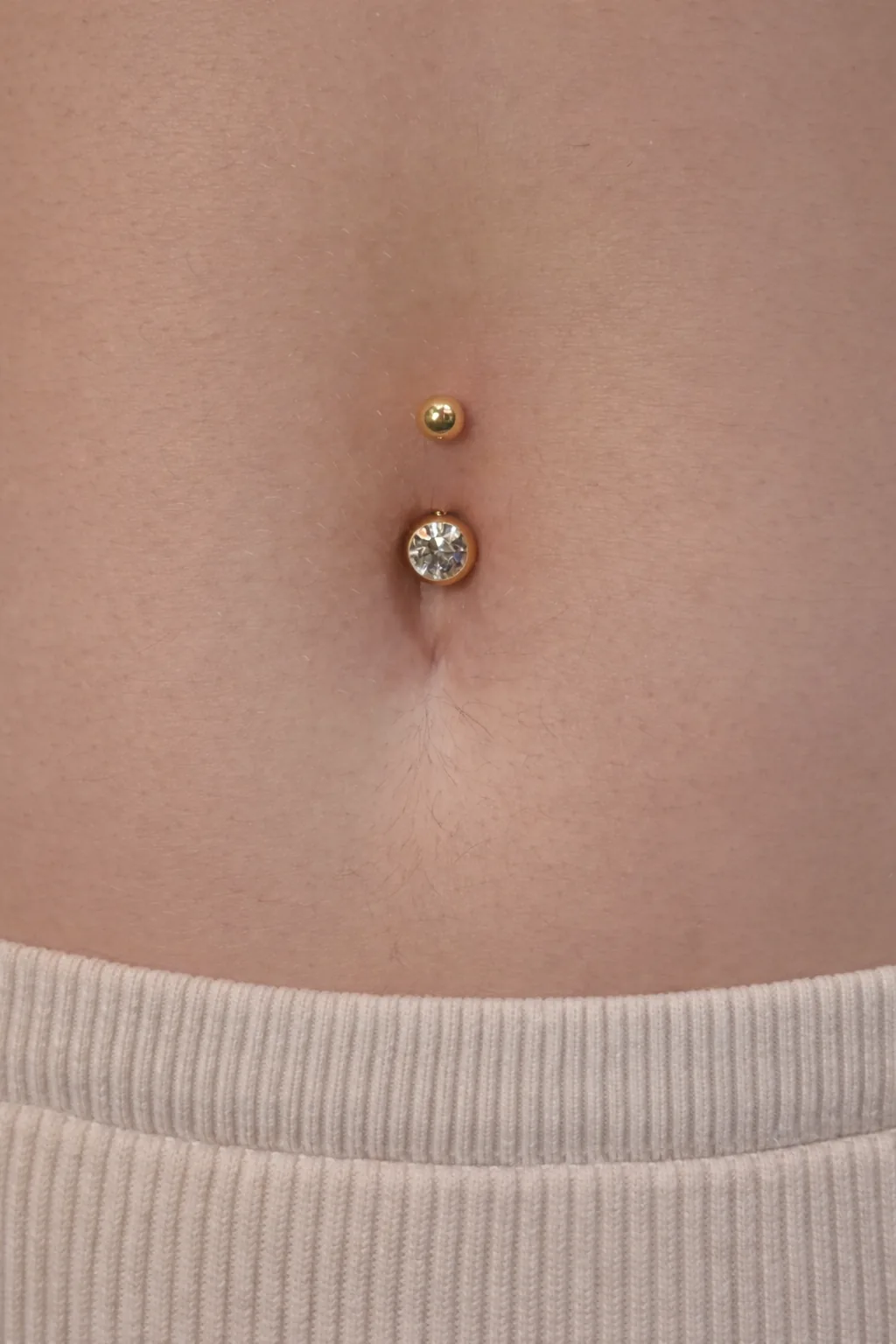 Nombril or cristal classique Piercing nombril or cristal Paris – Showtime Tattoo