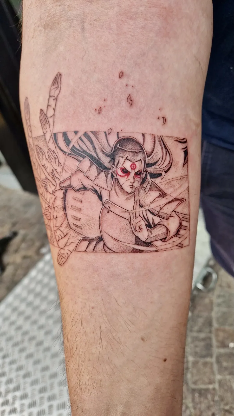 Anime tattoo Naruto Sharingan color arm Paris – Showtime Tattoo