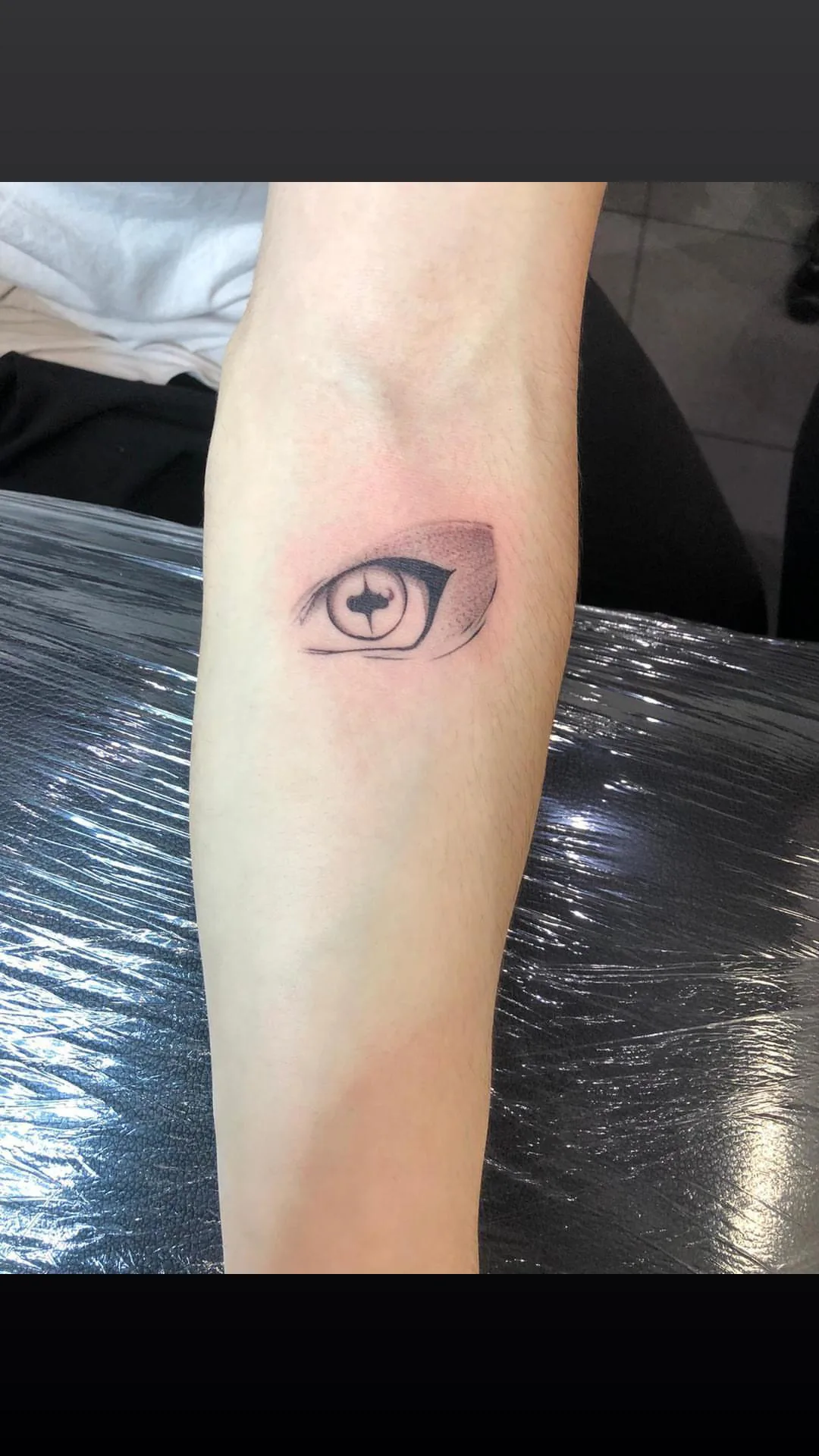Men's Sharingan eye fineline arm tattoo Paris – Showtime Tattoo