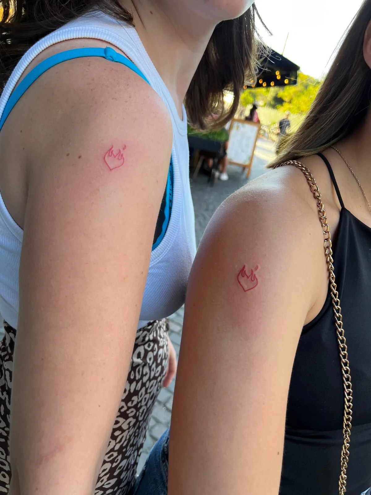 Couple flame matching red tattoo Paris – Showtime Tattoo