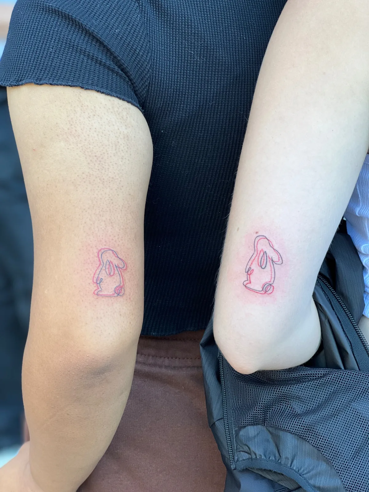 Couple rabbit matching red tattoo Paris – Showtime Tattoo
