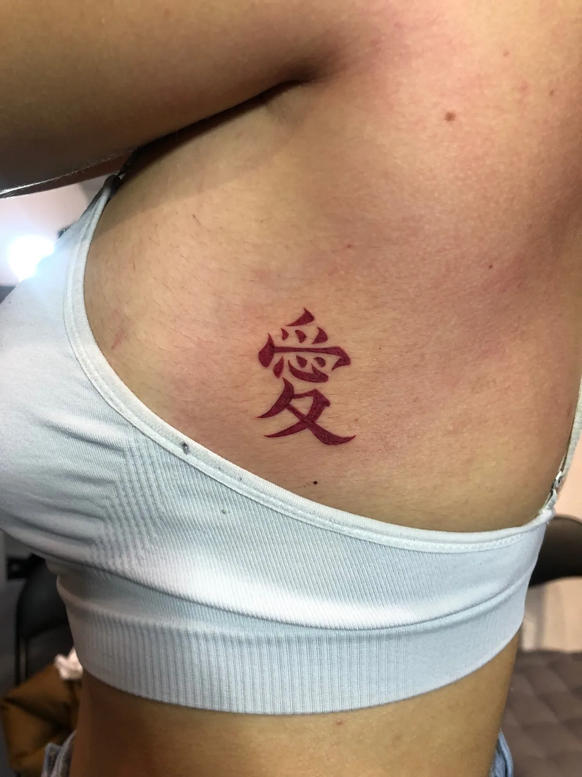 Kanji love tattoo red ribs Paris – Showtime Tattoo