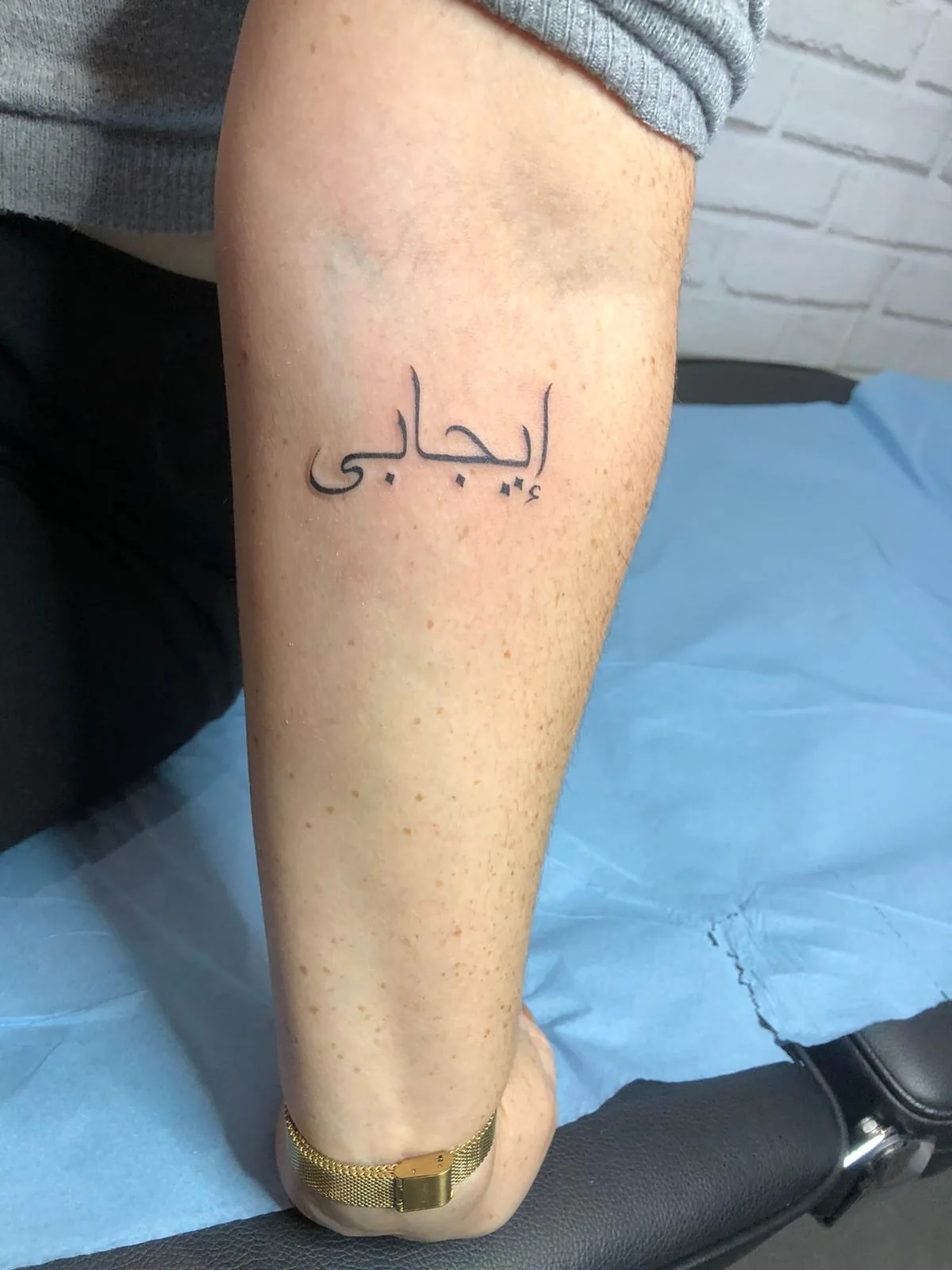 Arabic word Arabic word ankle lettering tattoo Paris – Showtime Tattoo