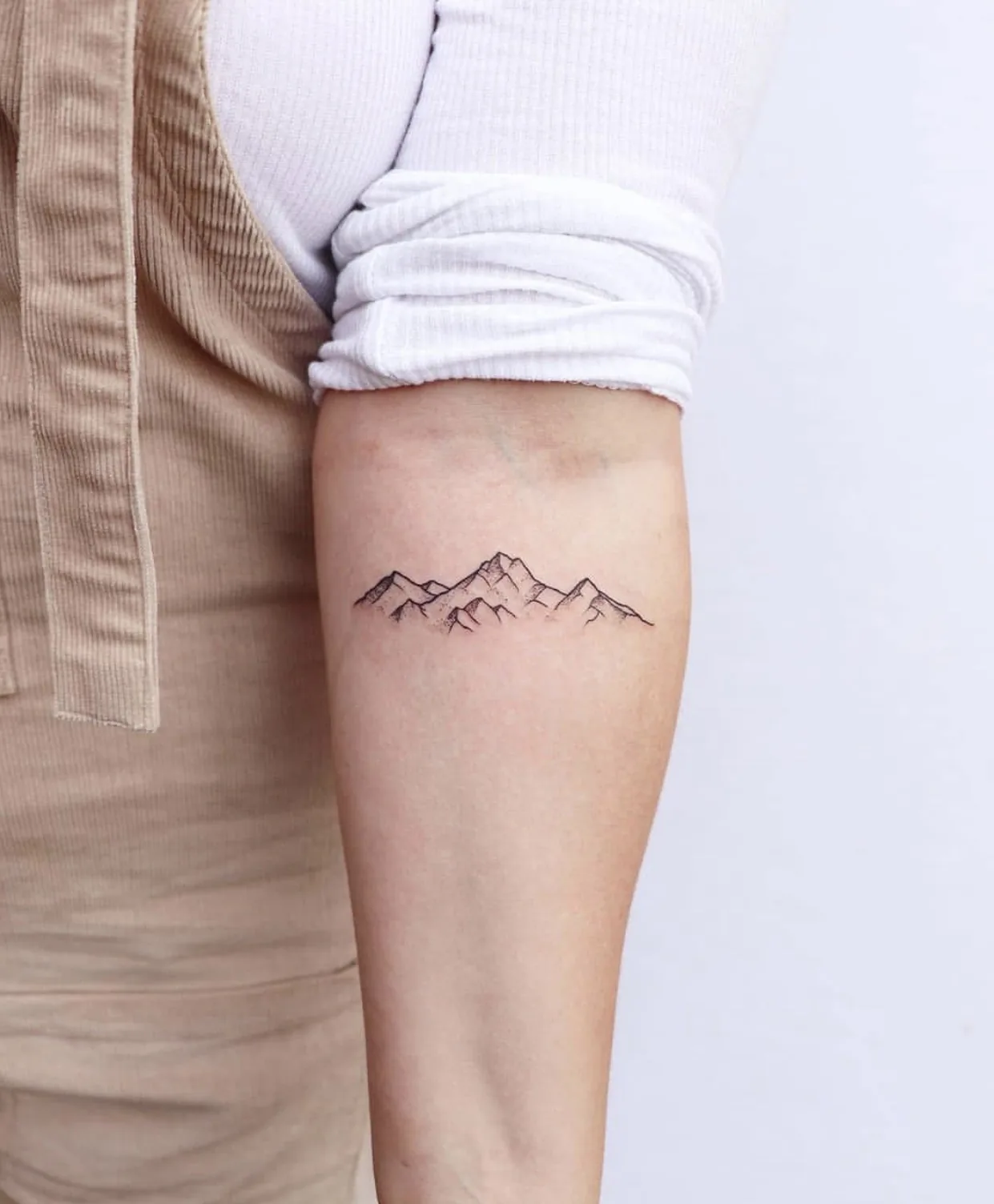 Mountain Minimalist mountain arm tattoo Paris – Showtime Tattoo